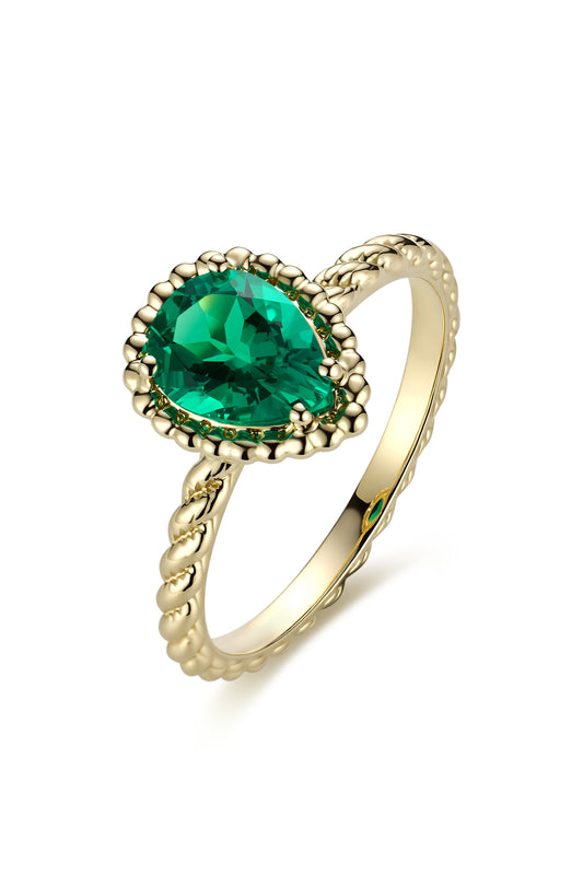 9K anillo color oro amarillo, con 1 esmeralda cultivada incrustada