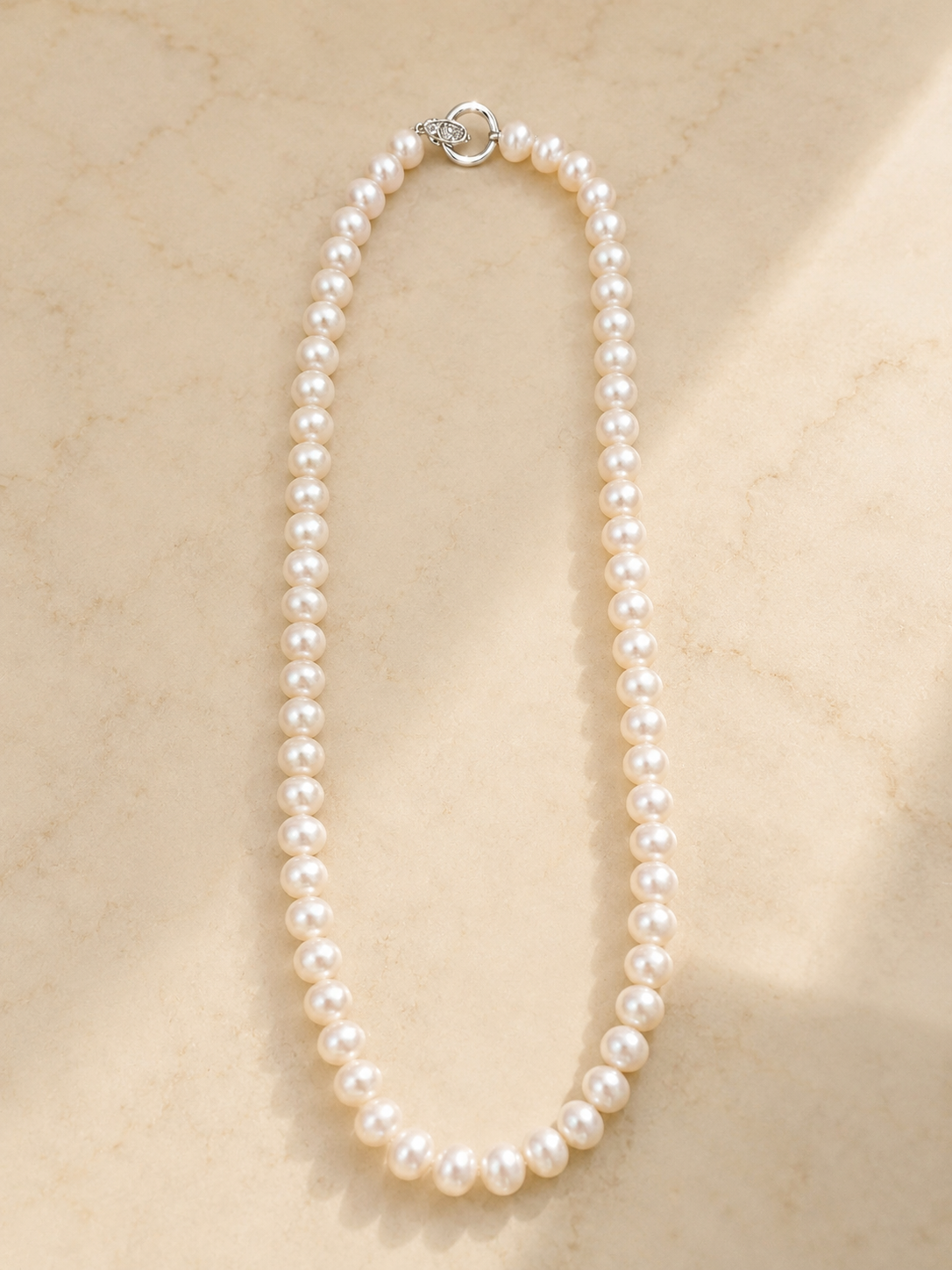 S925 collar de 42 cm en plata, con 65 perlas rosas de agua dulce de 6mm incrustada.