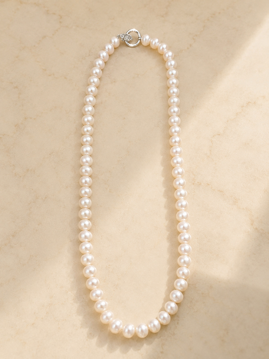 S925 collar de 42 cm en plata, con 65 perlas rosas de agua dulce de 6mm incrustada.